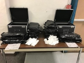 Police staked out two rental properties and intercepted 22 pounds of cannabis that were contained in two separate parcels.