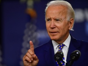 FILE: Presumptive Democratic presidential nominee former Vice President Joe Biden delivers a speech at the William Hicks Anderson Community Center, on July 28, 2020 in Wilmington, Delaware. /