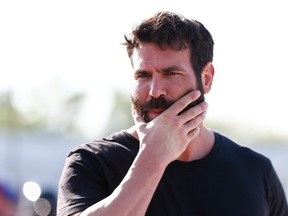 FILE - Poker player Dan Bilzerian attends qualifying for the NASCAR Sprint Cup Series Toyota Owners 400 at Richmond International Raceway on April 24, 2015 in Richmond, Virginia.