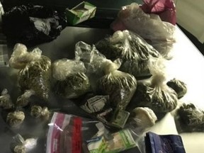 A look inside a second vehicle revealed a big bag of weed, also in plain view.