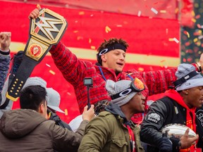 File - Patrick Mahomes of the Kansas City Chiefs celebrates with a heavy weight title belt at the Super Bowl Parade on February 5, 2020 in Kansas City, Missouri. Photo: Kyle Rivas/Getty Images