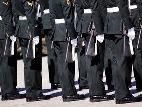 FILE: Military march held in Canada as the body of a fallen soldier was repatriated in September 2009.