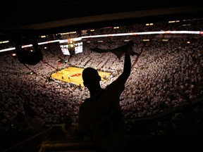 FILE: Miami Heat fan Ricardo Ballester cheers on his team against the New Jersey Nets in game two of the Eastern Conference Semifinals during the 2006 NBA Playoffs on May 10, 2006 at the American Airlines Arena in Miami, Fla. /