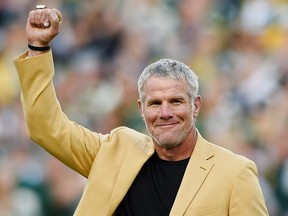 Former NFL quarterback Brett Farve is inducted into the Ring of Honor during a halftime ceremony during the game between the Green Bay Packers and the Dallas Cowboys at Lambeau Field on October 16, 2016 in Green Bay, Wisconsin.