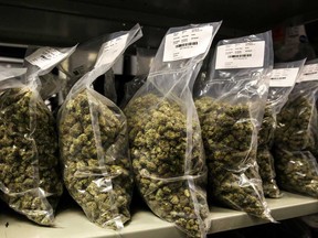 Packages of marijuana are seen on shelf before shipment at the Canopy Growth Corp. facility in Smith Falls, Ontario.