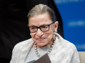 FILE: Supreme Court Justice Ruth Bader Ginsburg delivers remarks at the Georgetown Law Center in 2019, in Washington, DC.