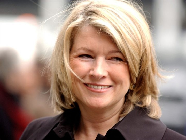  FILE: Martha Stewart smiles at onlookers as she arrives at federal court March 2, 2004 in New York City. /