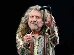 British singer Robert Plant performs on the Pyramid Stage, on the second day of the Glastonbury Festival of Music and Performing Arts in Somerset, southwest England, on June 28, 2014.