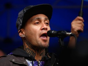 FILE: Musician Tiki Taane sings before a protest march down Queen Street on Aug. 15, 2015 in Auckland, New Zealand.