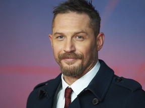 FILE: British actor Tom Hardy poses on arrival for the premiere of the film 'The Revenant' in London on Jan. 14, 2016.