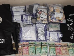The search of two homes that police said was connected to the Black Pistons and the Outlaws led to the seizure of more than $120,000 worth of drugs.