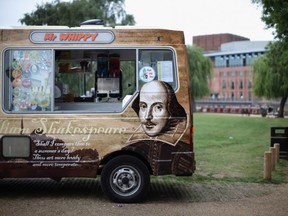 An ice cream van with a picture of William Shakespeare plys for trade near the Royal Shakespeare Company's theatre on the banks of the River Avon on June 27, 2011 in Stratford-upon-Avon, England.