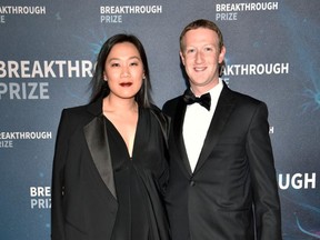 FILE: Priscilla Chan and Mark Zuckerberg attend the 2020 Breakthrough Prize Red Carpet at NASA Ames Research Center on Nov. 03, 2019 in Mountain View, Calif.