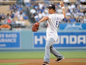 FILE: Actor Matthew McConaughey throws the ceremonial first pitch before the game between the New York Mets and Los Angeles Dodgers at Dodger Stadium May 20, 2009 in Los Angeles, Calif.