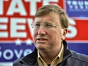 FILE: Mississippi Lieutenant Governor and Republican Gubernatorial candidate Tate Reeves speaks to reporters before appearing with President Donald Trump at a 