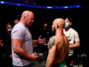 FILE: UFC president Dana White (L) talks with Brian Kelleher (R) of the United States after winning his Men's Bantamweight bout during UFC Fight Night at VyStar Veterans Memorial Arena on May 13, 2020 in Jacksonville, Florida.