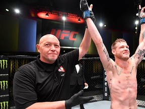 FILE:  Kevin Croom reacts after his submission victory over Roosevelt Roberts in a lightweight fight during the UFC Fight Night event at UFC APEX on September 12, 2020 in Las Vegas, Nevada.
