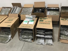 The police discovered more than 280 pounds (127 kg) of cannabis in U-Haul boxes. /