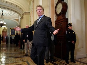 FILE: Sen. Rand Paul (R-KY) gestures toward reporters following the weekly Republican policy luncheon at the U.S. Capitol Oct. 24, 2017 in Washington, DC. /