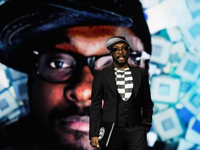 FILE: Recording artist and Intel's director of creative innovation will.i.am holds his Intel Ultrabook device during Intel's presentation at the 2012 International Consumer Electronics Show at The Venitian on Jan. 10, 2012 in Las Vegas, Nev. /