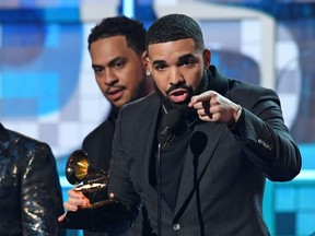 FILE: Canadian rapper Drake accepts the award for Best Rap Song for "Gods Plan" during the 61st Annual Grammy Awards on Feb. 10, 2019, in Los Angeles.