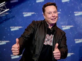FILE: SpaceX owner and Tesla CEO Elon Musk poses as he arrives on the red carpet for the Axel Springer Awards ceremony, in Berlin, on Dec. 1, 2020. /