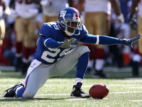 FILE: Sam Madison #29 of the New York Giants celebrates an interception against the San Francisco 49ers on October 21, 2007 at Giants Stadium in East Rutherford, New Jersey.