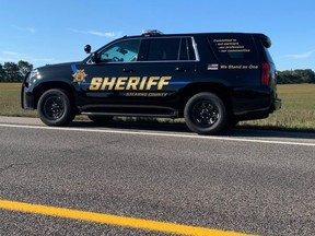 Upon arriving at the scene, the deputy could see that the vehicle was running and the driver was slumped behind the wheel, snoring slightly. /