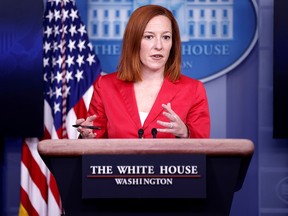 FILE: White House press secretary Jen Psaki holds a press briefing in Washington, March 11, 2021.