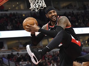 FILE: Portland Trail Blazers forward Carmelo Anthony (00) grabs a rebound against the Chicago Bulls during the first half at United Center. /