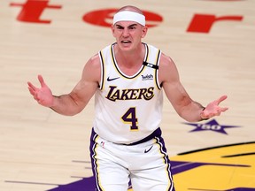 FILE: Alex Caruso of the Los Angeles Lakers reacts after being called for a foul during the second half of Game Four of the Western Conference first-round playoff series against the Phoenix Suns at Staples Center on May 30, 2021 in Los Angeles, Calif. /