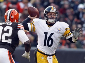 FILE: Quarterback Charlie Batch #16 of the Pittsburgh Steelers throws to a receiver as he is pressured by defensive lineman Frostee Rucker #92 of the Cleveland Browns at Cleveland Browns Stadium on Nov. 25, 2012 in Cleveland, Ohio. /