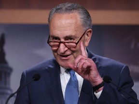 FILE: Senate Majority Leader Charles Schumer (D-NY) talks to reporters after the Senate voted against the formation of an independent commission to investigate the attack at the U.S. Capitol on May 28, 2021 in Washington, DC. /