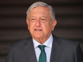 FILE: Andres Manuel Lopez Obrador, President of Mexico, gestures at Palacio Nacional on June 8, 2021 in Mexico City. /