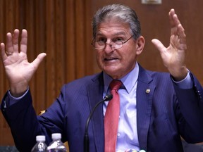 FILE: U.S. Sen. Joe Manchin (D-WV) speaks during a hearing before Transportation, Housing and Urban Development, and Related Agencies Subcommittee of Senate Appropriations Committee at Dirksen Senate Office Building June 10, 2021 on Capitol Hill in Washington, DC.