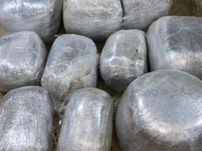 Officers found 10 bulky parcels wrapped in transparent plastic. /