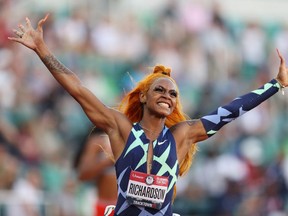 Sha'Carri Richardson celebrates winning the women's 100 metres at the U.S. track and field trials June 18. Shortly after the trials, Richardson was suspended for a month for testing positive for marijuana – a ban that will keep her from competing at the Tokyo Olympics (Patrick Smith/Getty Images)