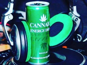 The can is bright green and shows two cannabis leaves in white and darker green. /