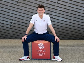 Tom Daley of Great Britain poses for a photo to mark the official announcement of the Diving team selected to represent Team GB for the Tokyo 2020 Olympic Games at the London Aquatics Centre on June 02, 2021 in London, England.