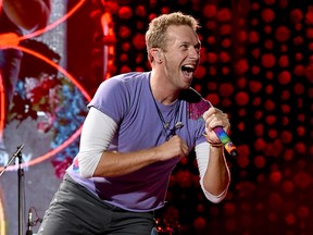 FILE: Singer Chris Martin of Coldplay performs at the Rose Bowl on October 6, 2017 in Pasadena, Calif. /