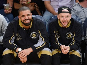 Drake joins longtime producer Noah “40” Shebib (R) as an investor, partner and advisor to Bullrider. /