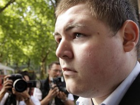 FILE: British actor Jamie Waylett arrives at Westminster Magistrates court in central London, on July 16, 2009. /