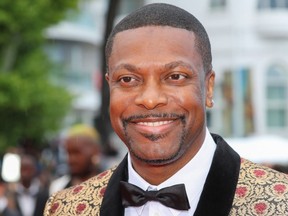 FILE: U.S. actor Chris Tucker poses as he arrives on May 14, 2018 for the screening of the film "BlacKkKlansman" at the 71st edition of the Cannes Film Festival in Cannes, southern France. /