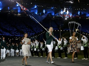 FILE: Australia's Lauren Jackson carries the flag during the Opening Ceremony at the 2012 Summer Olympics, Friday, July 27, 2012, in London. /