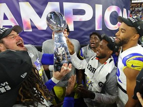 FILE: Los Angeles Rams plays celebrate with the Vince Lombardi Trophy after Super Bowl LVI at SoFi Stadium on Feb. 13, 2022 in Inglewood, Calif. The Los Angeles Rams defeated the Cincinnati Bengals 23-20. /