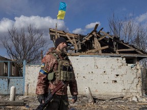 FILE: Marat Saifulin, Ukranian serviceman stands in the village of Lukyanivka outside Kyiv, as Russia's invasion of Ukraine continues, Ukraine, Mar. 27, 2022. /