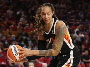 FILE: Brittney Griner #42 of the Phoenix Mercury handles the ball during Game Three of the 2021 WNBA semifinals at Desert Financial Arena on October 03, 2021 in Tempe, Arizona. /