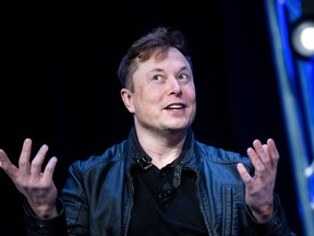 In this file photo taken on March 9, 2020 Elon Musk, founder of SpaceX, speaks during the Satellite 2020 at the Washington Convention Center in Washington, DC. /