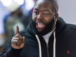 FILE: Rapper Killer Mike talks about the upcoming South Carolina Democratic presidential primary at Smoke's Barber Shop Friday, Feb. 26, 2016 in Columbia, S.C. /