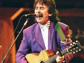 FILE: Picture dated Oct. 17, 1992 in New York showing George Harrison performing "Absolutely Sweet Mary" during an all-star tribute to the music of Bob Dylan at Madison Square Garden. /